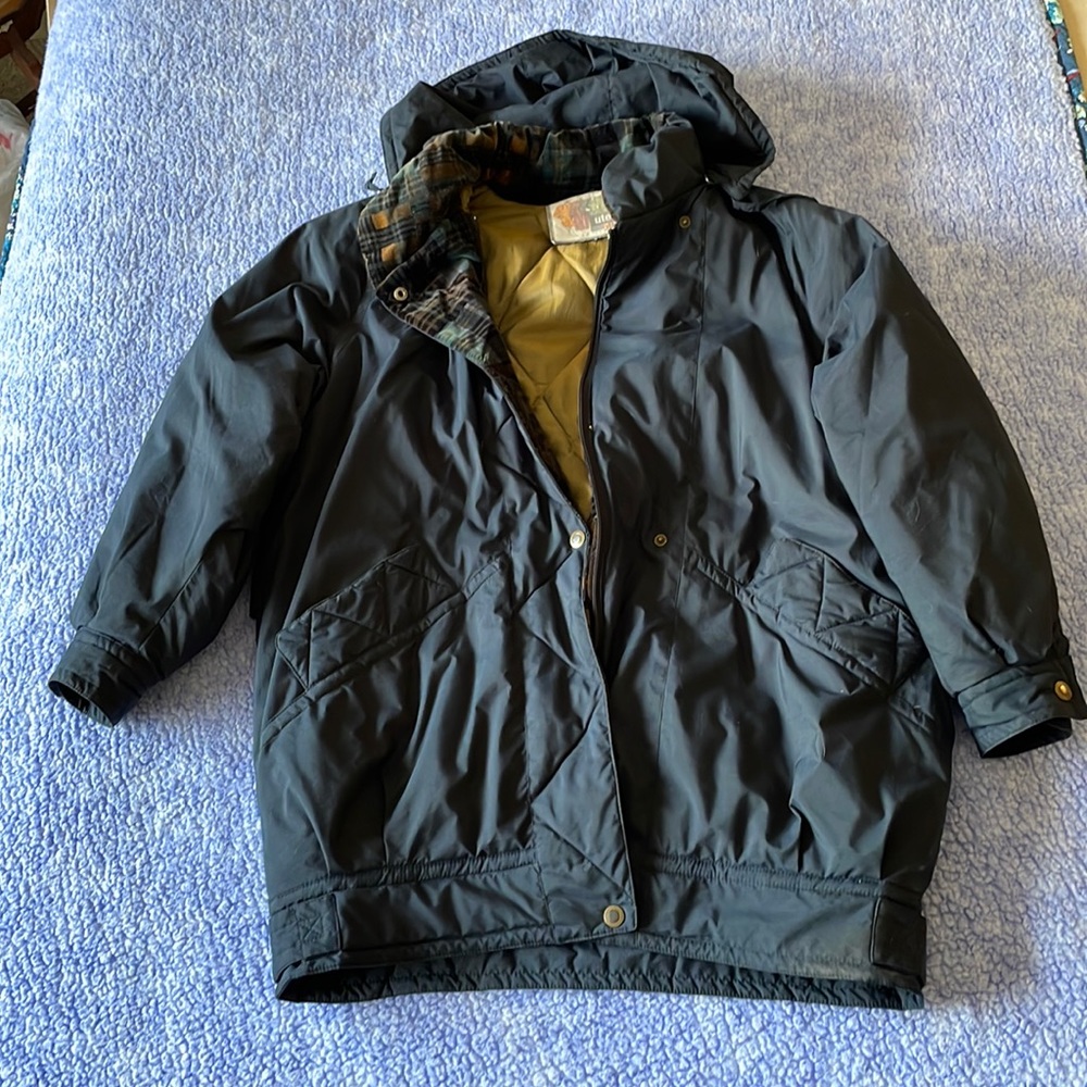 Woman’s blue Utex 50 coat size medium
